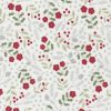 Picture of white fabric with small red flowers and green leaves