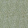 Picture of winter pine sprigs on green fabric with small white flowers