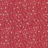 Picture of winter pine sprigs on red fabric with white specks