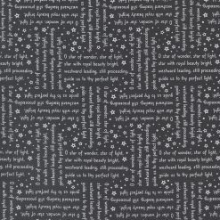 Westword leading, still proceeding, Christmas song words on black background fabric