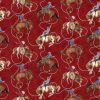 Cowboy Blues fabric with cowboys on horses with a red background