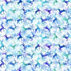 Watercolor reindeer fabric from Northcott’s Midwinter Magic collection featuring multicolor stags and snowflakes on a snowy white background.